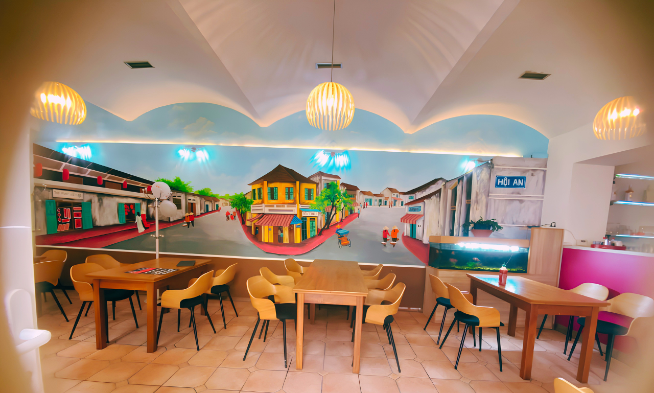 Warm and inviting restaurant interior with decorative lighting and artistic wall patterns.